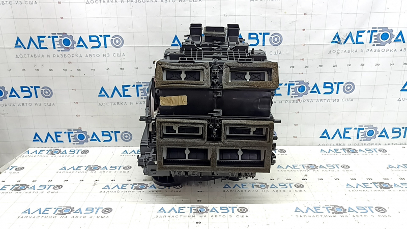 The heater housing is bare, left side of the 2021 Nissan Rogue, us-built, without radiators.