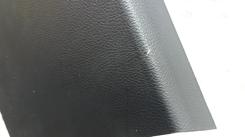 Jeep Grand Cherokee WL 22-25 rear center console trim, black, under USB Hub and rear row heating buttons, scratches