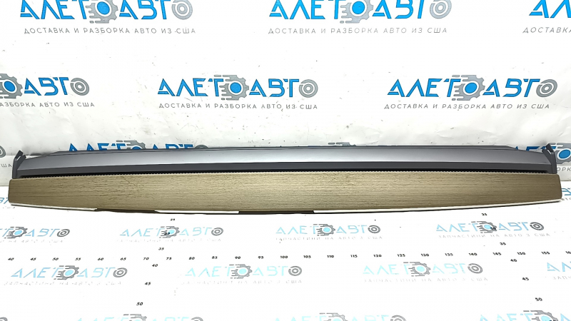 Tesla Model 3 18's upper dashboard trim panel - wood grain, cracked wood, scratches
