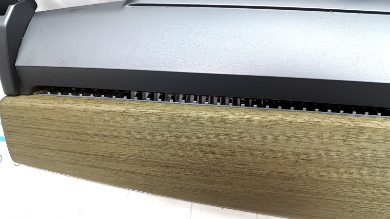 Tesla Model 3 18's upper dashboard trim panel - wood grain, cracked wood, scratches