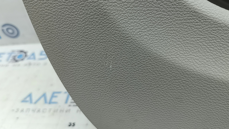 Lower left arch trim for Chrysler Pacifica 17-24, center section for pockets, gray, with plugs, scratches, needs cleaning