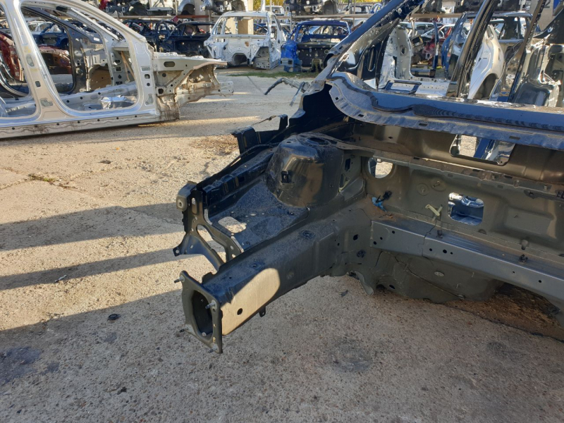 Front right quarter panel of a Ford Escape MK3 2017-2019, black on the body, dents