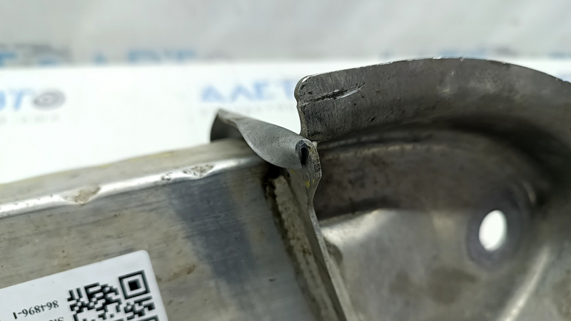 The fang of the lower reinforcement of the front bumper left Toyota Sienna 21-25 is dented, torn
