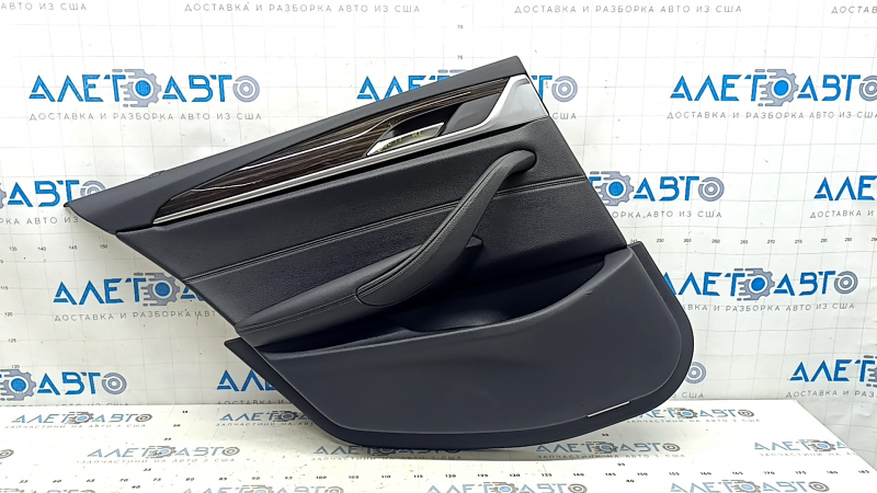 Rear left door panel assembly BMW 5 G30 17-23 black leather, Sensatec, armrest and insert black leather, glossy wood molding, with backlight, with handle, dent, tear