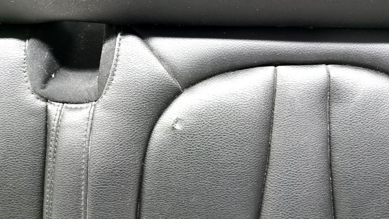 Rear row of seats, upper part, right, Lincoln MKC 15-19, dark brown leather, perforated, heated, dry-cleanable, dents