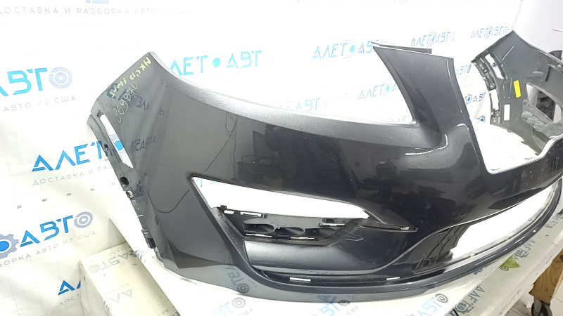 Bare front bumper for a 19-19 Lincoln MKC without parking sensors and a tow hook, J7 graphite, non-factory holes, scratches, and nicks