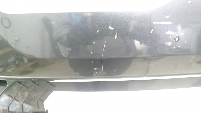 Bare front bumper for a 19-19 Lincoln MKC without parking sensors and a tow hook, J7 graphite, non-factory holes, scratches, and nicks