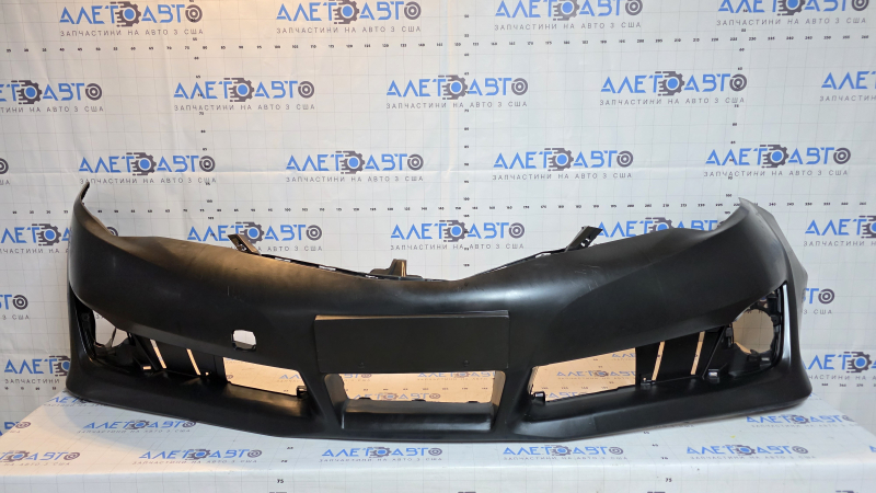 Front bumper bare Toyota Camry v50 12-14 USA SE under the plug, dented, scratches