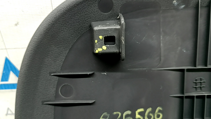 The rear driver's seat cover for a 2022 Hyundai Ioniq is black, with cracks in the fasteners and scratches.