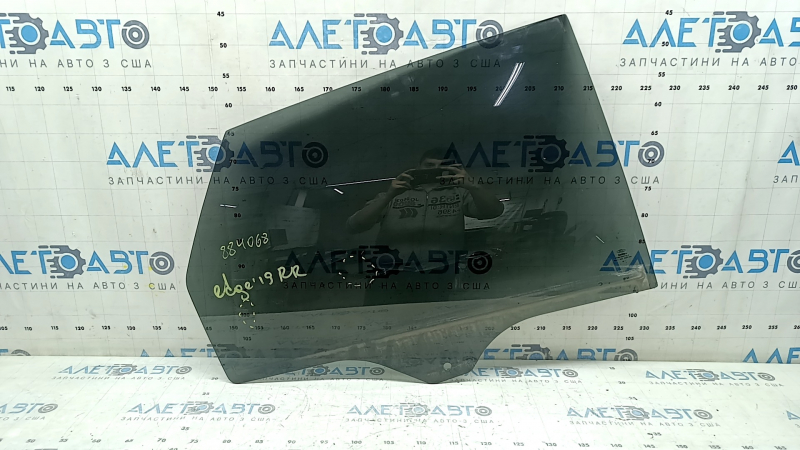 Ford Edge 15-24 rear right door glass, factory tinted, scratches