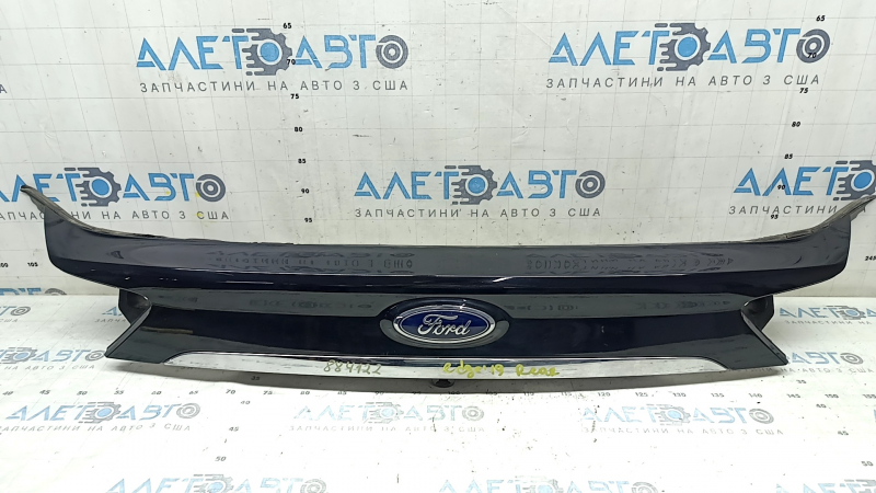 Ford Edge 19-24 trunk lid trim with chrome molding and emblem, torn seal