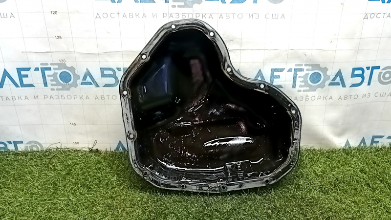 Toyota Camry v55 2.5 15-17 USA 2AR-FE oil pan is dented and scratched.