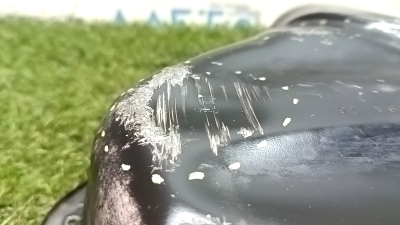 Toyota Camry v55 2.5 15-17 USA 2AR-FE oil pan is dented and scratched.