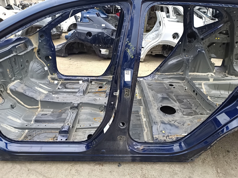 The center left body pillar of a Honda CRV 17-22 on the body, dents