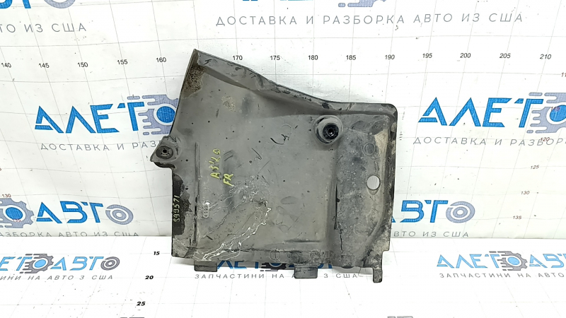 The front right underbody protection of the Audi A5 F5 18-25 is pressed and worn.