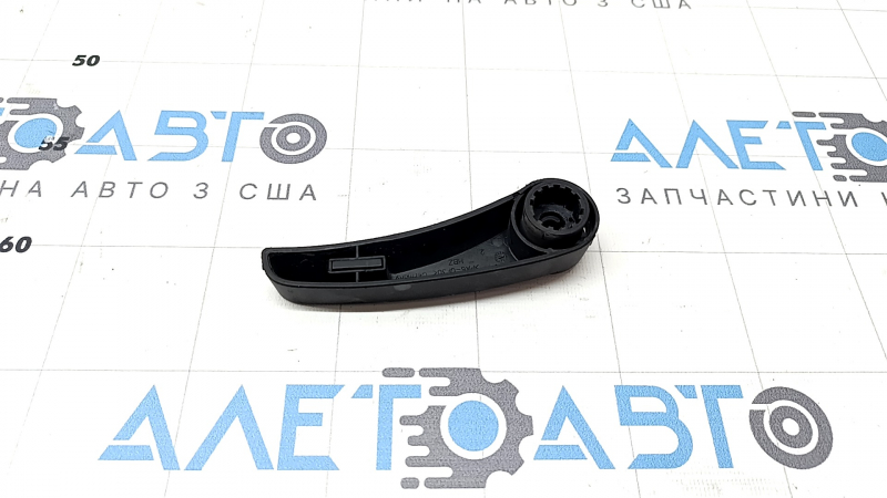 The hood release handle for the Porsche Macan 15-23 is located under the hood.