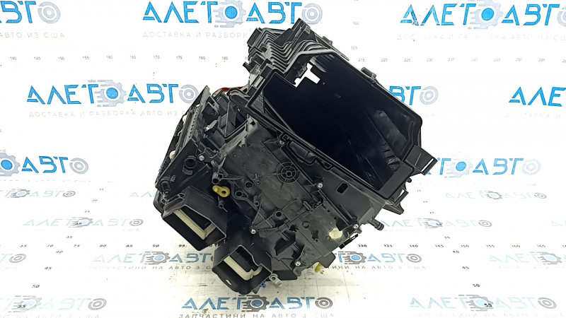 The bare heater housing of a Porsche Macan 15-26