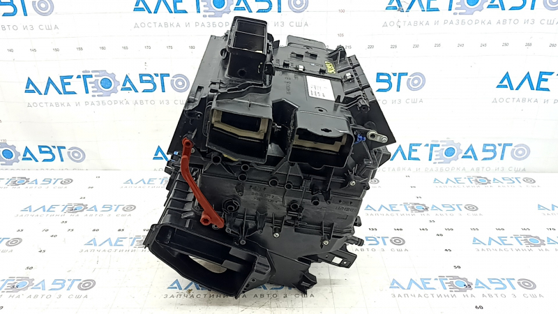 The bare heater housing of a Porsche Macan 15-26