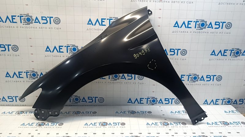 The front left fender of a Toyota Camry v70 18-24 is dented.