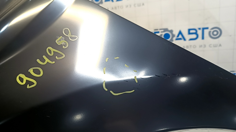 The front left fender of a Toyota Camry v70 18-24 is dented.