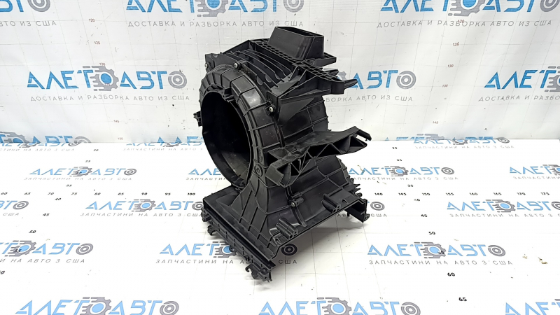 The bare heater housing and ventilation of the Jeep Cherokee KL 14-23