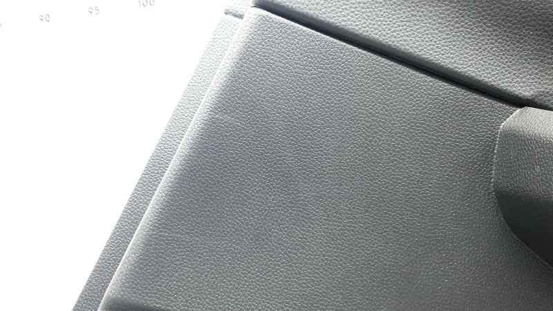 Rear right door panel, Honda CRV 23-26, black leather with orange stitching, Sport, glossy black molding, scratches