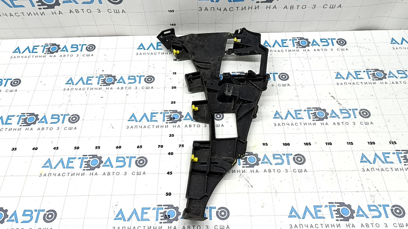The left front bumper bracket for the Audi Q8 19-23 is large and the fasteners are broken.