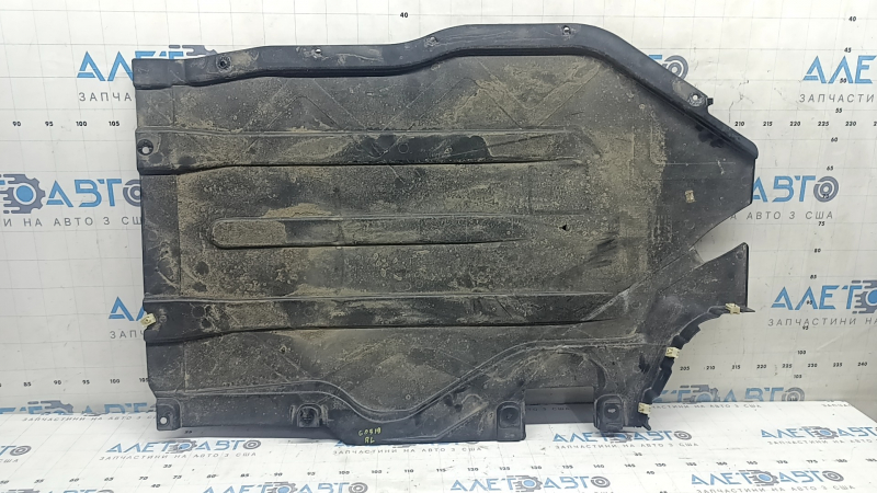 The rear left underbody protection of the BMW X5 G05 19-26 is dented.