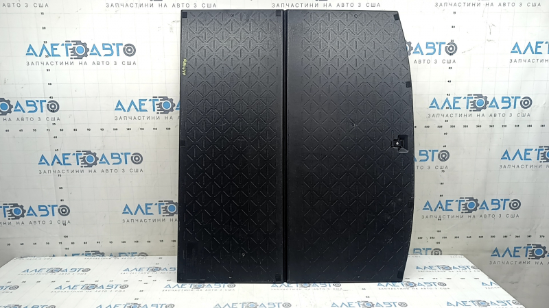 The central trunk floor of a Toyota Rav4 19-24 is black and needs cleaning.