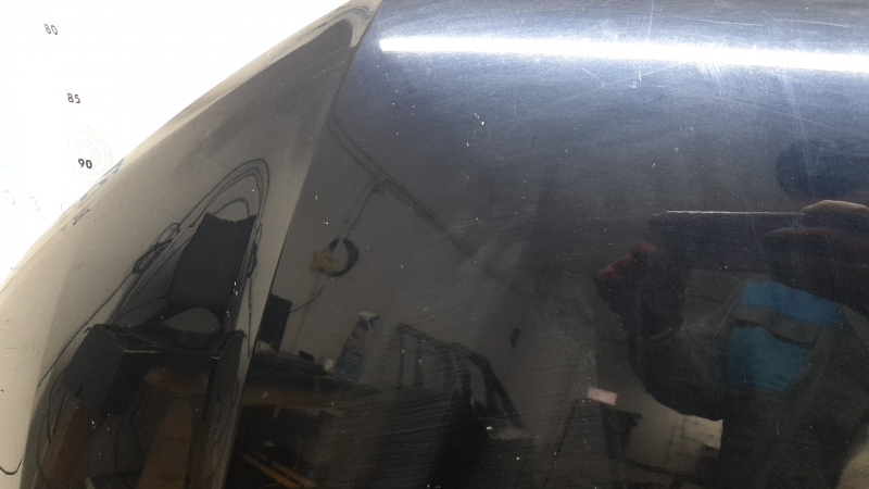The hood of an Audi Q7 16-26 aluminum, bare, scratches, chips, glued on