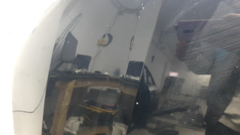 The hood of an Audi Q7 16-26 aluminum, bare, scratches, chips, glued on