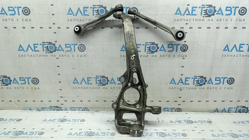 Front left axle trunnion of an Audi Q7 16-26 with arms, torn silent blocks