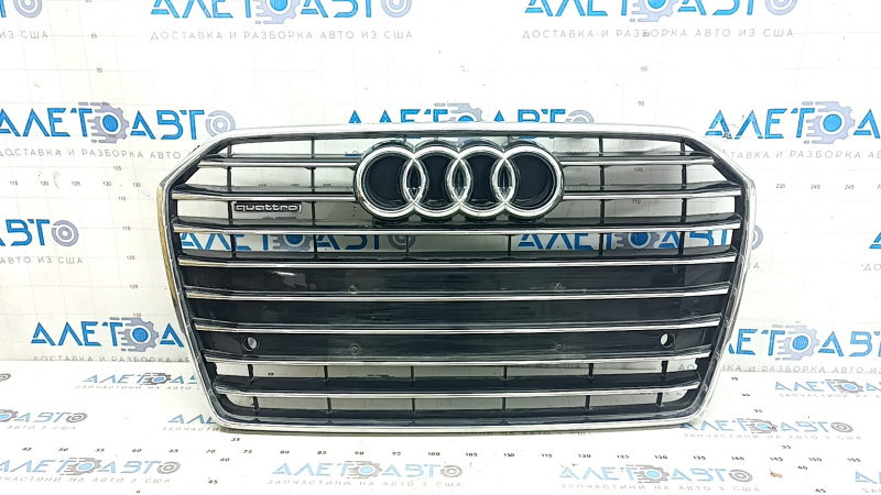 Complete radiator grille for an Audi A6 C7 2016-2018, with the "quattro" emblem, gloss black + chrome, for parking sensors, chrome trim, non-factory holes