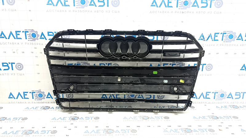 Complete radiator grille for an Audi A6 C7 2016-2018, with the "quattro" emblem, gloss black + chrome, for parking sensors, chrome trim, non-factory holes