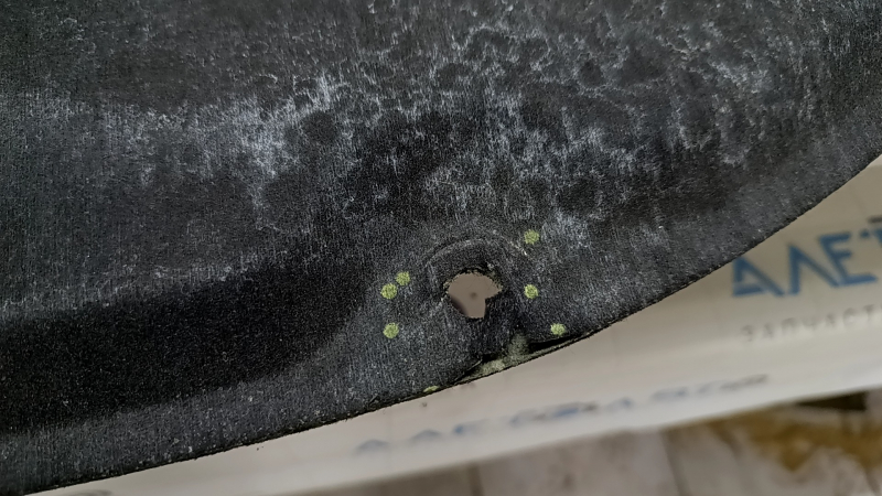 The hood insulation of the Toyota Camry v70 18-20 US is torn.