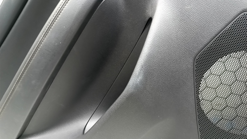 Rear left door panel for Mazda CX-5 17-23 with black leather insert, gray leather armrest, butt, needs cleaning, scratches
