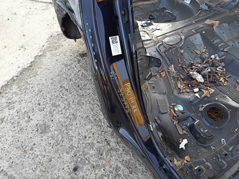 Right rear fender dent on a Toyota Prius 30 13-15, black, dented, bump