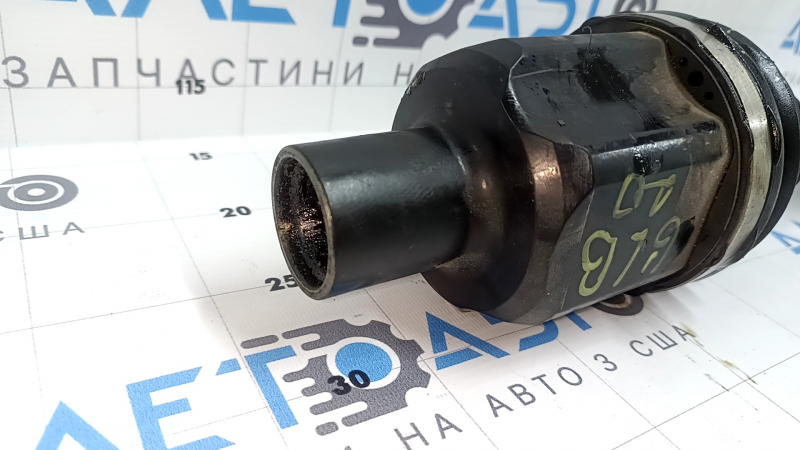 The front right drive axle shaft of a Mercedes X247 GLB 20-26 AWD has a torn boot.