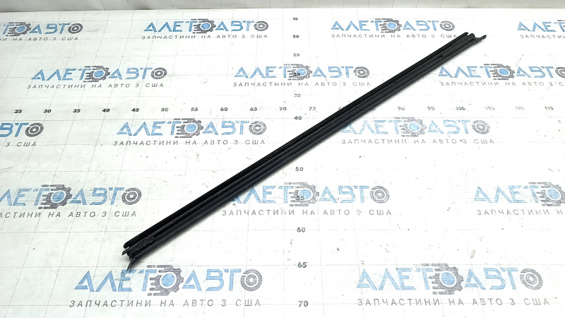 Inner glass seal for the front left door of a Kia Sportage 23-26
