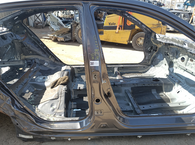The center right body pillar of a 13-17 Honda Accord has dents on the body.
