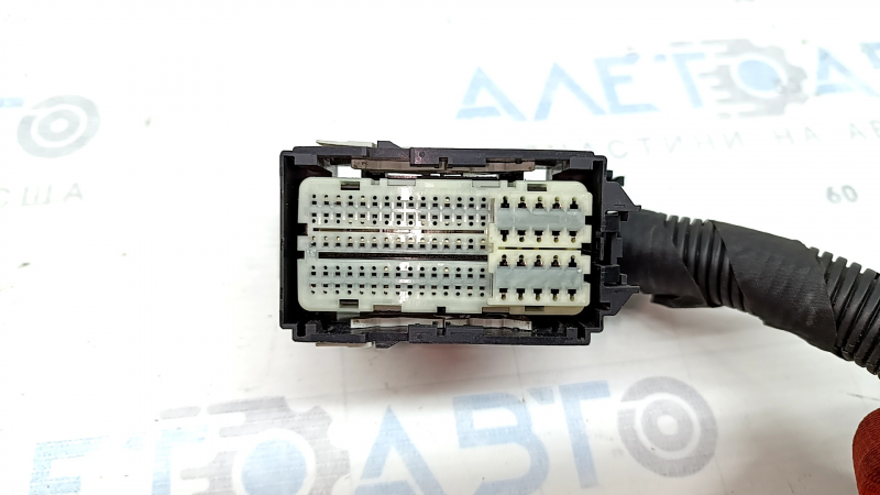 The ECU chip for the Jeep Renegade 19-23 1.3T engine computer, with a B connector.