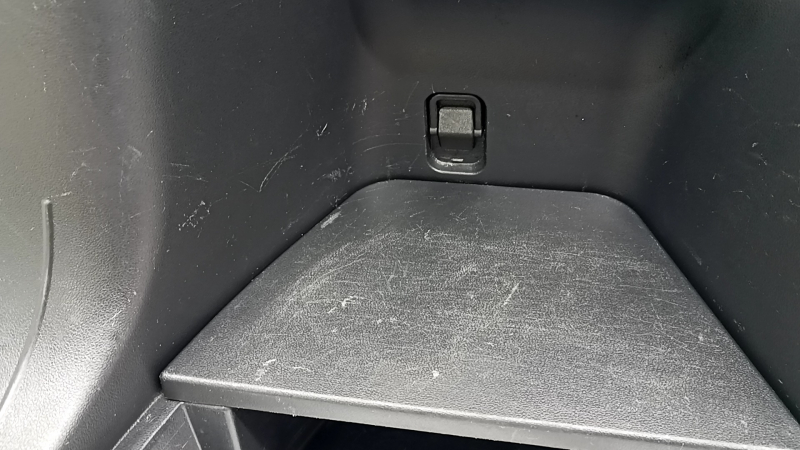 Left arch trim for Hyundai Tucson 2020-2026, black, 1.6T HEV, PHEV, with hooks, lamp, and cigarette lighter, scratches