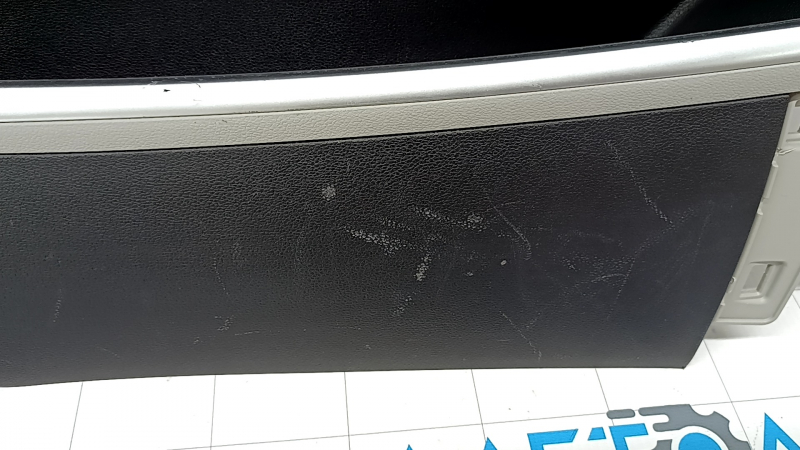 Right rear center console side trim for Hyundai Tucson 2022-2026, black with gray and chrome, type 1, scratches, whitened plastic