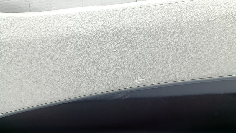 Right rear center console side trim for Hyundai Tucson 2022-2026, black with gray and chrome, type 1, scratches, whitened plastic