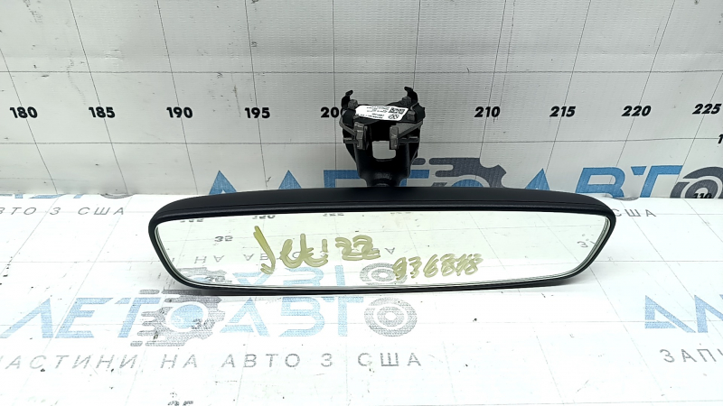 The interior mirror of a VW Jetta 19-22 is black and empty, with amalgam coming out.
