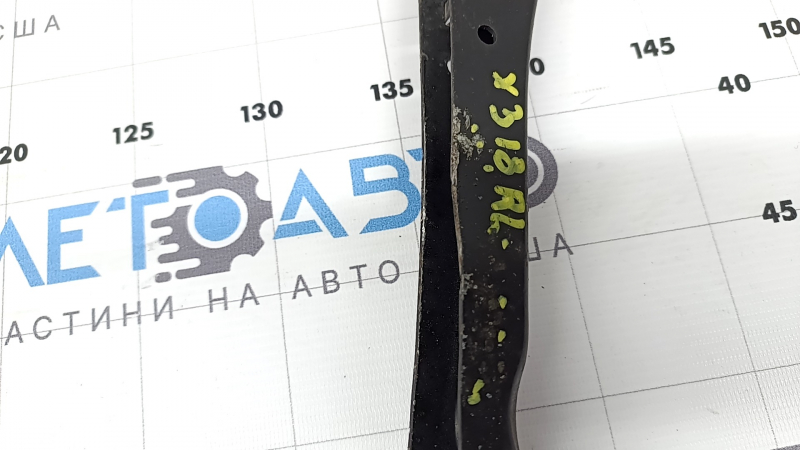 The rear left longitudinal arm of the BMW X3 G01 18-24 is dented.
