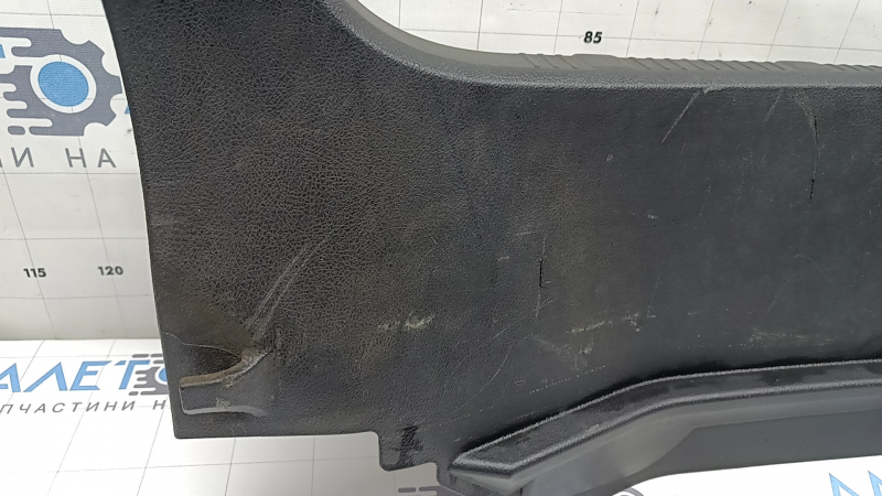 The trunk opening trim for a Toyota Avalon 13-18 is black, worn, the fastener is broken, the plastic has turned white.