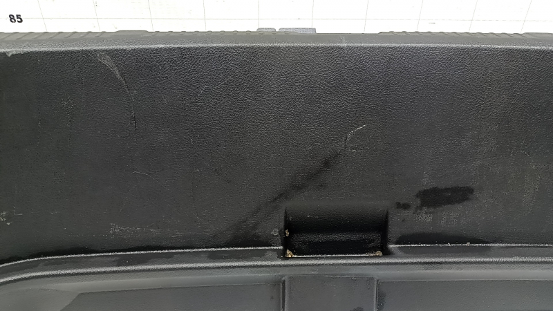 The trunk opening trim for a Toyota Avalon 13-18 is black, worn, the fastener is broken, the plastic has turned white.