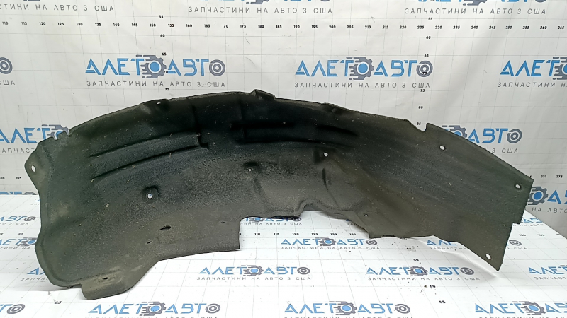 The rear right fender liner of Toyota Sienna 21-26 is dented.