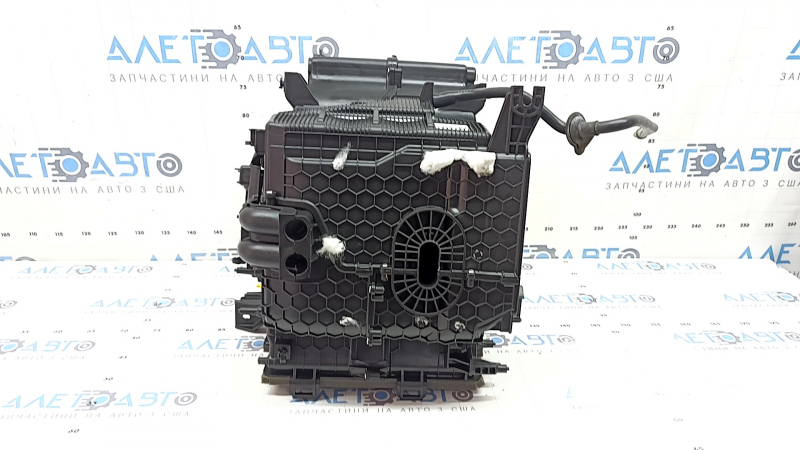 The bare heater housing of the Kia Niro 23-26 PHEV air conditioner for the rear row airflow